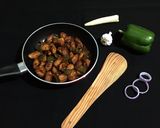 A picture of step 11 of Chilli Baby Corn.