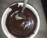 A picture of step 1 of 1 bite chocolatey marshmallow pops.