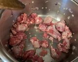 Foto del passaggio 2 della ricetta Risotto ai fiori di zucchina salsiccia e zafferano