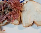 A picture of step 1 of Leftover Pizza Topping Sandwich.