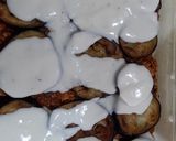 صورة لخطوة 18 من وصفة صنية الباذنجان 🍆 والبطاطس 🥔 بالدجاج المفروم