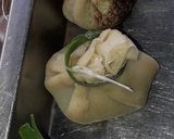A picture of step 10 of Samosas meat pouch.