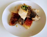 A picture of step 1 of Crispy Salmon Skin.