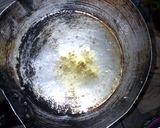 A picture of step 2 of Fried Bread with Egg.