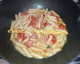 Foto del passaggio 3 della ricetta Penne con i Pomodorini del Piennolo