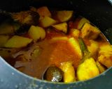 A picture of step 2 of Aloo baigun jhol.
