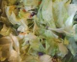 A picture of step 1 of Lettuce and Mandarin Orange Salad.