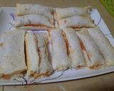 A picture of step 4 of Pizza bread roll.