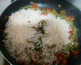 Foto del paso 6 de la receta: Arroz caldoso con verduras, chorizo y Paté