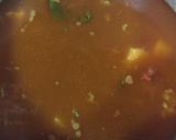 A picture of step 9 of Aloo chicken.