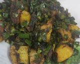 A picture of step 5 of Green onion potato sabzi.