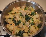 A picture of step 4 of Swiss Chard and Potato Casserole with Crispy Pepper Powder, Feta, and Lemon Zest.