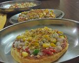 A picture of step 8 of Veg pizza at home.