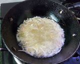 A picture of step 1 of Rui Mohini with Cashewnuts and Fried Onion.