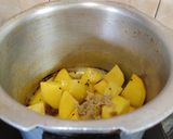 A picture of step 4 of Tomato Potato Curry with Panch Phoran.