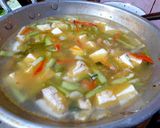 Foto langkah ke 4 dari resep Labu Siam, Tongkol, dan Tahu Masak Santan.
