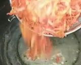 A picture of step 1 of Gajar ka halwa with milkmaid.
