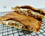 Foto del paso 7 de la receta: Empanada de Codillo con Cebolla y Scamorza Ahumada
