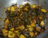 A picture of step 4 of Poi Saag and Potato Sabzi.