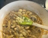 A picture of step 6 of Pork Medallions in a Mushroom and Sherry creamy sauce.