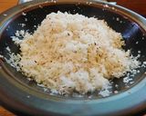 A picture of step 3 of Sweet Puttu (steamed rice cake from Kerala) with coconut.