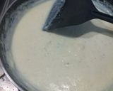 A picture of step 9 of Spinach Corn Ravioli in white sauce.