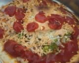 A picture of step 4 of ચીઝ બ્રસ્ટ પીઝા (cheese burst pizza recipe In Gujarati).