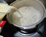 A picture of step 2 of Doodh daliya in pressure cooker (with different toppings).