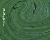 A picture of step 3 of Hariyala laccha paratha (layered green flat bread).