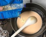 A picture of step 4 of Macaroni cheesy spicy saucy.