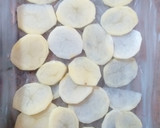 Foto del paso 6 de la receta: Papas al horno con nata, cebolla