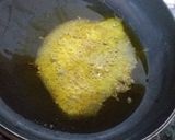 A picture of step 2 of Hari Mirchi Ke Tiopre.