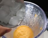 A picture of step 3 of Mango smoothie with lemon.