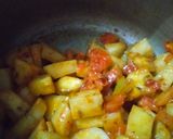 A picture of step 2 of Baingan aloo.
