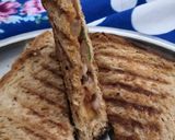 A picture of step 4 of Onion tomato grill sandwhich.
