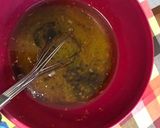 A picture of step 4 of Christmas cookies dipped in honey, aka melomakarona.