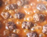 A picture of step 4 of Meatballs cooked in an EVOO from Spain Sauce.