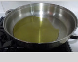 Foto del paso 7 de la receta: Puntilla con alcachofas y ajos tiernos