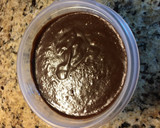 A picture of step 5 of Fudge Swirled Oreo Bottom Cheesecake Cupcakes.