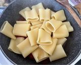 Foto del passaggio 5 della ricetta Paccheri ai pomodorini e rucola