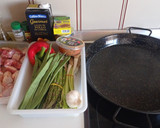 Foto del paso 1 de la receta: Arroz con pollo, costilla y verdura