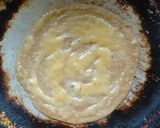 A picture of step 4 of Egg wrap with veggies.