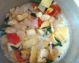 A picture of step 7 of Appam with vegetable stew.