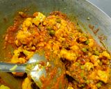 A picture of step 8 of Gobhi Matar Masala.