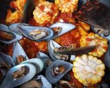 Foto langkah ke 9 dari resep Kerang Hijau Saus Padang.