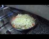 Foto del paso 4 de la receta: Hojas de col rellenas de verduras, pollo y arroz