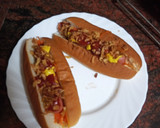 Foto del paso 2 de la receta: Perrito caliente con zanahoria encurtida y cebolla frita
