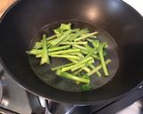 Une image de l'étape 2 de Kai lan aux tomates,carotte,ail et sauce huître.