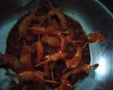 A picture of step 13 of Prawn stuffed litchi.