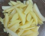 A picture of step 3 of Garlic honey chilli potato.